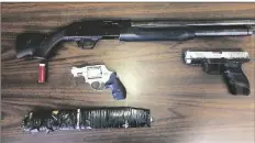  ?? LOANED PHOTO ?? THESE FIREARMS WERE SEIZED by police in San Luis Rio Colorado on Friday from three men accused of violating Mexico’s weapons laws.