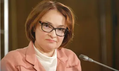  ?? ?? The governor of Russia's central bank, Elvira Nabiullina, has cut interest rates from 20% to 17%. Photograph: Bloomberg/Getty Images