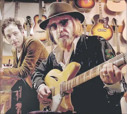  ?? Los Angeles Film Festival ?? JAKOB DYLAN, left, and Tom Petty are among musicians in “Echo in the Canyon,” which kicks off L.A. Film Festival on Thursday.