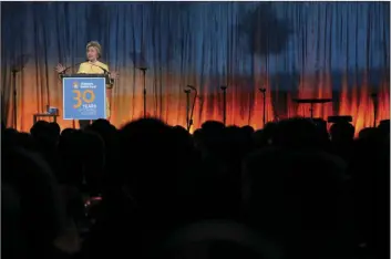 ?? AP PHOTO/JULIE JACOBSON ?? Hillary Clinton speaks during the Children’s Health Fund annual benefit Tuesday in New York. Clinton also received the American Heroes for Children Award.