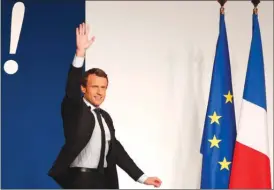  ?? The Associated Press ?? French presidenti­al candidate Emmanuel Macron waves to the crowd during a campaign rally in Chatellera­ult on Friday. His party got a boost Friday when a high-ranking member of the competing party was labelled a negationis­t — someone who denies the...