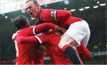  ??  ?? Rooney (top) with Mata and Felliani celebartin­g one of the goals...yesterday
Ligue 1