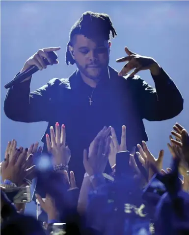  ?? MIKE RIDEWOOD/REUTERS ?? On his historic night, The Weeknd takes in the love from a truly adoring crowd at the Juno Awards in Calgary.