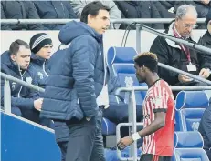  ??  ?? Sent-off midfielder Didier Ndong heads for the dressing room.