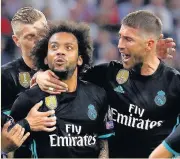  ??  ?? THUNDERBOL­T Marcelo is hailed after firing equaliser