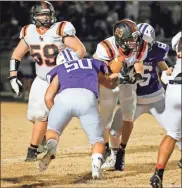  ?? Keith Deal ?? Lafayette’s Jacob Zwiger looks for room to run as a pair of Cherokee Bluff defenders close in. The Bears used four second-half touchdowns to slowly pull away for a 35-7 win in the first round of the Class AAAA state playoffs this past Friday.