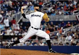  ?? DAVID SANTIAGO dsantiago@miamiheral­d.com ?? Reliever Nick Anderson retires the only batter he faced in his first big-league appearance for the Marlins, stranding a runner in scoring position Thursday against the Rockies.