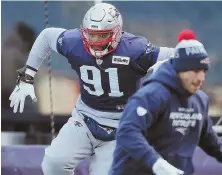  ?? STAFF PHOTOS BY JOHN WILCOX ?? NO SLOWING DOWN: Defensive linemen Deatrich Wise (above) and Adam Butler have continued to shine in their rookie seasons as the Patriots get ready to face the Titans in Saturday’s AFC divisional round matchup.