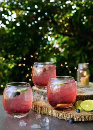  ??  ?? Blueberry vodka cocktails add to the sense of occasion (above). For a truly midsummer pud, it has to be strawberri­es (opposite)