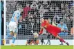  ?? EPA ?? REAL Madrid goalkeeper Andriy Lunin saves the penalty of Mateo Kovacic of Manchester City during Wednesday’s Champions League quarter-final penalty shoot-out.
|