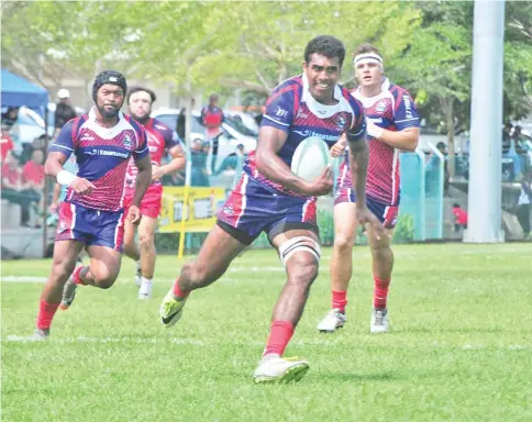  ??  ?? TRYING HARD ... A Borneo Eagles player in control of the ball during an earlier match in the Borneo Sevens. The defending champions are through to the Cup semifinals.