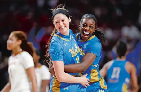  ?? PATRICK SEMANSKY/AP PHOTO ?? UCLA’s Lindsey Corsaro, left, and forward Michaela Onyenwere celebrate after the sixth-seeded Bruins upset No. 3 Maryland 85-80 on Monday night in College Park, Md. UCLA will face No. 2 UConn on Friday in the NCAA Sweet 16 in Albany, N.Y.