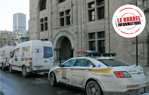  ??  ?? Une trentaine de policiers ont débarqué dans les bureaux de Dartech à Montréal, hier, soit une semaine après avoir visité les locaux de CPU Services, à Québec.