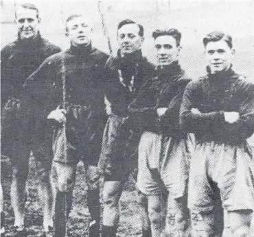  ??  ?? LINE-UP: Ernie Coleman stands at the front of this group of Halifax Town players during training, behind him (in order), Herbert Housley, Jerry Best, Ben Wheelhouse and Jack Barber. Photo: Johnny Meynell