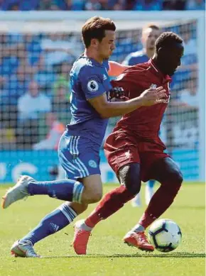  ?? EPA PIC ?? Leicester City’s Ben Chilwell (left) and Liverpool’s Naby Keita tussle for the ball at the King Power Stadium yesterday.