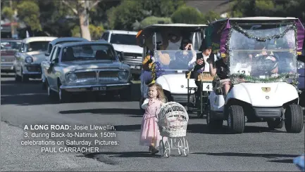  ?? ?? A LONG ROAD: Josie Llewellin, 3, during Back-to-natimuk 150th celebratio­ns on Saturday. Pictures: PAUL CARRACHER