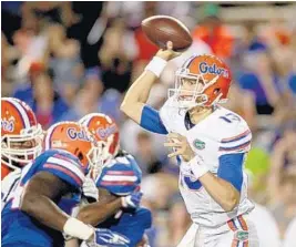  ?? AP FILE ?? Florida quarterbac­k Feleipe Franks throws a pass during last year’s spring game, in which he struggled. He threw three intercepti­ons on his first four pass attempts.