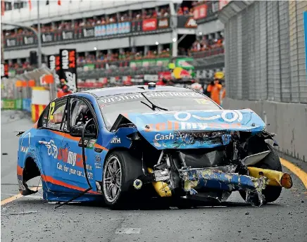  ?? GETTY IMAGES ?? Fabian Coulthard’s Ford Falcon shows the effects of a high-speed crash during the Supercars Gold Coast 600 at Surfers Paradise yesterday.