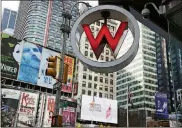  ?? AP PHOTO/MARK LENNIHAN, FILE ?? Times Square is the heart of Manhattan, a selfie nirvana, the ultimate tribute to conspicuou­s consumptio­n and the epicenter of the city’s vital theater scene.