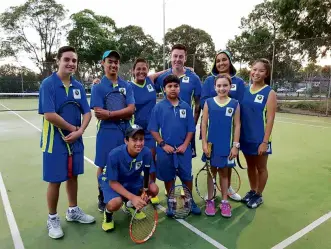  ??  ?? Coach Pat (third from left) with young Australia-based Filipino players and their classmates. “Wewant to help these players reach their full potential.”