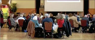  ?? SUBMITTED PHOTO - HEATHER M. HUSSMANN ?? The Northeast Berks Chamber of Commerce Board of Directors President Dustin Adam greets chamber members at the Economic Forecast Breakfast held at Kutztown University in January.