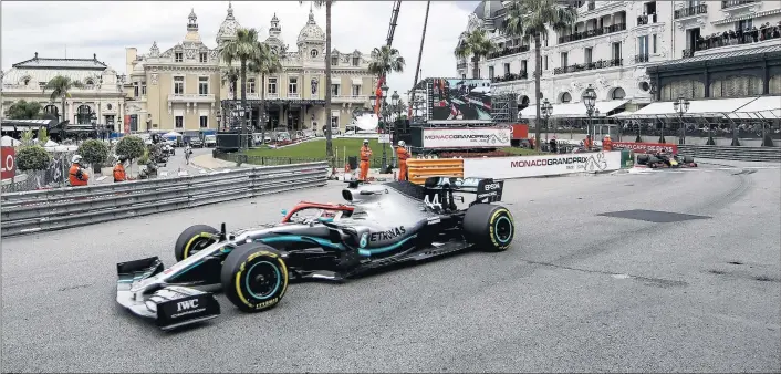  ?? LUCA BRUNO/AP ?? Lewis Hamilton steers his car during the Monaco Formula One Grand Prix on May 26, 2019. This year’s race has been canceled for the first time in 66 years because of the pandemic.