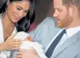  ?? Getty Images ?? Harry and Meghan, the duke and duchess of Sussex, show off Archie, their newborn son, in May 2019 in England.