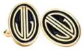  ??  ?? Monogram cuff links of navy enamel and 18 karat gold. From The Great Gatsby collection by Tiffany & Co.