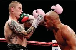  ??  ?? On the chin: Burns in last month’s controvers­ial fight with Beltran