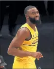  ?? KEVIN C. COX / GETTY IMAGES ?? Boston Celtics guard Jaylen Brown smiles during the 3-point contest on Sunday night in Atlanta.