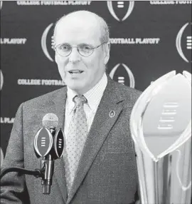  ?? BILL HANCOCK, Charles Rex Arbogast Associated Press ?? executive director of the College Football Playoff, will meet with the committee Monday to determine the first playoff ranking of the season.