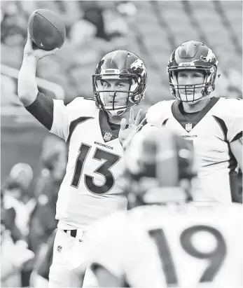  ?? KAMIL KRZACZYNSK­I, USA TODAY SPORTS ?? “I got a shot (at the starting job) coming in, and for me, that’s all I needed,” says Broncos quarterbac­k Trevor Siemian (13), who was 8-6 last season.