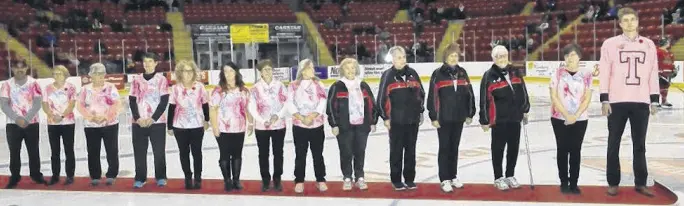  ?? JIM WEBB PHOTO ?? Photograph­er Jim Webb captured the moment as Truro Bearcats recently paid tribute to the local Dragon Boat Team SOS. From left, Raj Makkar, Cindy Grant, Margaret Ann Dauphinee, Margaret Harding, Trish Toole, Cyndi Daley, Jocelyn Cowell, Sheila Clarke, Susan Park, Heather Macintosh, Dianne Mantle, Pam Tonary, Gina Macdonald and Zak Yewchuk of the Bearcats.