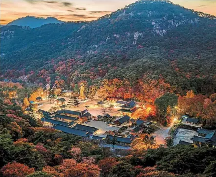  ?? — Korea Tourism Organisati­on/dpa ?? The beopjusa Temple is beautifull­y nestled on the slopes of songnisan mountain near seoul.