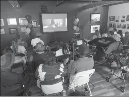  ?? STOCKTON RECORD ?? Local residents watch a screening of the short documentar­y “We Are Survivors” during the Stockton Crime Survivors for Safety and Justice event.