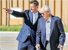  ?? [PHOTO BY CHRIS LANDSBERGE­R, THE OKLAHOMAN] ?? Oklahoma City Mayor David Holt stands with his father, Stroud Holt, on Friday to point out the location of the Mary Ann and Stroud Holt Garden in the MAPS 3 downtown park. Announced Friday, the first private gift to the Scissortai­l Park Foundation Endowment Fund was made by the mayor to honor his parents.