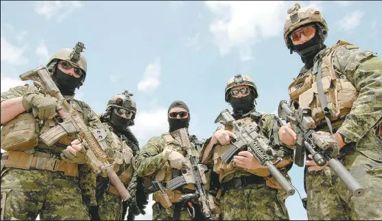  ?? DAVID PUGLIESE, THE OTTAWA CITIZEN ?? Members of the Canadian Special Operations Regiment take a break from training at CFB Petawawa. According to Brig.-Gen. Mike Day, commander of the country’s special operations forces, the question is not whether the regiment should continue, but ‘How much do we want it to grow by?’