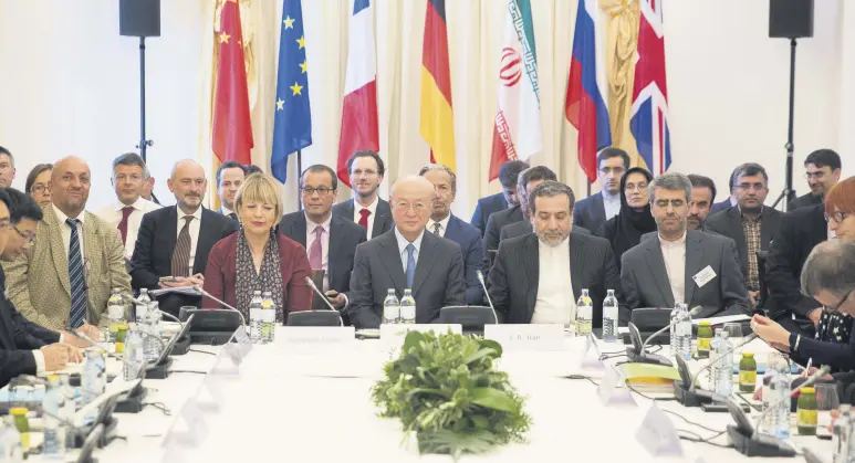  ??  ?? Members of the Joint Comprehens­ive Plan of Action (JCPOA) commission attend a meeting at the Palais Coburg in Vienna, May 25, 2018.