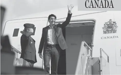  ?? ADRIAN WYLD / THE CANADIAN PRESS ?? Prime Minister Justin Trudeau arrives in the Philippine­s Sunday for the ASEAN summit. The meeting will give Trudeau an opportunit­y to advance his trade agenda with the emerging bloc of 10 Southeast Asian countries, which is already Canada’s...