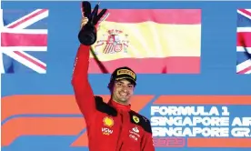  ?? ?? Carlos Sainz celebrates winning the Singapore GP after leading from pole. Photograph: Clive Rose/Getty Images