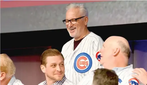  ?? AP ?? Joe Maddon, appearing at the Cubs Convention, is entering the last year of his contract, sparking speculatio­n that new bench coach Mark Loretta is in line to replace him.