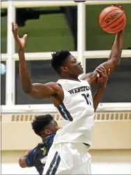  ?? PETE BANNAN — DIGITAL FIRST MEDIA FILE ?? Westtown’s Mohamed Bamba grabs a rebound.