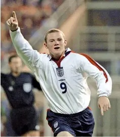  ?? — AFP photo ?? (FILES) England’sWayne Rooney celebrates his goal against Macedonia during their Euro 2004 Qualifying match at the City stadium in Skopje September 6, 2003.