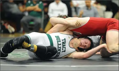  ?? BEA AHBECK/NEWS-SENTINEL ?? Lodi's Justin Medeiros and Tracy's Brock McCarty during their 184 pound match during the TCAL Championsh­ip finals at St. Mary’s High in Stockton on Saturday.