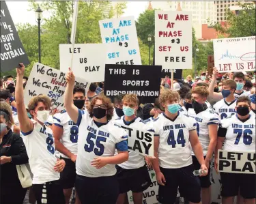  ?? Christian Abraham / Hearst Connecticu­t Media ?? High school football coaches, players and their families from across the state went to the Hartford State Capitol building in September to protest not being able to play due to the coronaviru­s.