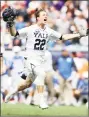  ?? Maddie Meyer / Getty Images ?? Yale’s Ryan McQuaide celebrates after the Bulldogs beat Duke 13-11 to win the men’s lacrosse national championsh­ip game at Gillette Stadium on Monday.