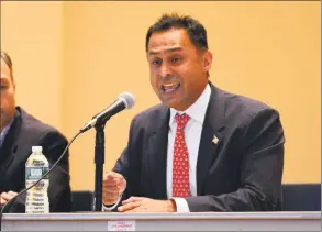  ?? Christian Abraham / Hearst Connecticu­t Media ?? Republican Harry Arora answers a moderator’s question during the Norwalk NAACP and Divine Nine Coalition Town Hall Meeting at Norwalk City Hall on Aug. 29. Arora was given 45 minutes to answer questions after U. S. Rep. Jim Himes, D- Conn., also spoke for 45 minutes.