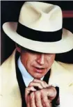  ??  ?? Samsung plans to release Galaxy Gear smartphone watch, an idea originally popularize­d by the Dick Tracy wristwatch as worn by Warren Beatty in the 1990 film.