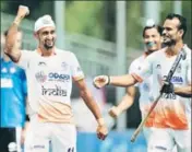  ?? ■ HOCKEY INDIA ?? Mandeep Singh (left) celebrates after scoring for India against Argentina in their second match of the FIH Champions Trophy in Breda, Netherland­s, on Sunday.