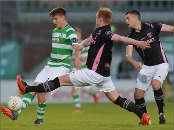  ??  ?? Seán Boyd of Shamrock Rovers posing problems for Stephen Last and Craig McCabe.